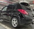 Черный Ниссан Тиида, объемом двигателя 1.6 л и пробегом 176 тыс. км за 6200 $, фото 8 на Automoto.ua