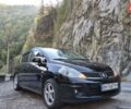 Черный Ниссан Тиида, объемом двигателя 1.6 л и пробегом 176 тыс. км за 6200 $, фото 1 на Automoto.ua