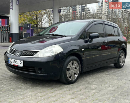 Черный Ниссан Тиида, объемом двигателя 1.6 л и пробегом 172 тыс. км за 6900 $, фото 1 на Automoto.ua