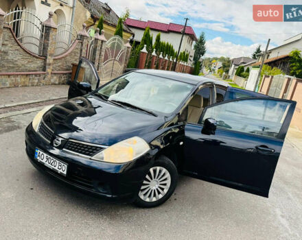 Черный Ниссан Тиида, объемом двигателя 1.6 л и пробегом 187 тыс. км за 5800 $, фото 74 на Automoto.ua