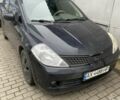 Черный Ниссан Тиида, объемом двигателя 1.6 л и пробегом 200 тыс. км за 4500 $, фото 1 на Automoto.ua