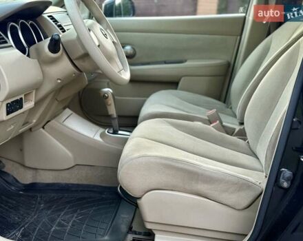 Черный Ниссан Тиида, объемом двигателя 1.6 л и пробегом 199 тыс. км за 5900 $, фото 20 на Automoto.ua