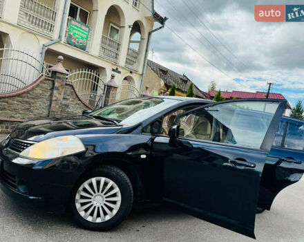 Черный Ниссан Тиида, объемом двигателя 1.6 л и пробегом 187 тыс. км за 5800 $, фото 75 на Automoto.ua