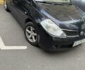 Черный Ниссан Тиида, объемом двигателя 1.6 л и пробегом 160 тыс. км за 4601 $, фото 1 на Automoto.ua