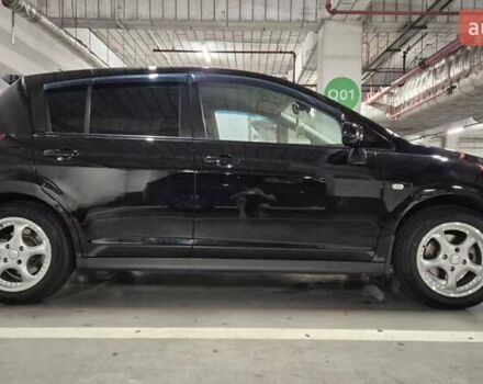Черный Ниссан Тиида, объемом двигателя 1.6 л и пробегом 176 тыс. км за 6200 $, фото 6 на Automoto.ua