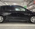 Черный Ниссан Тиида, объемом двигателя 1.6 л и пробегом 176 тыс. км за 6200 $, фото 6 на Automoto.ua