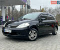 Черный Ниссан Тиида, объемом двигателя 1.6 л и пробегом 172 тыс. км за 6900 $, фото 1 на Automoto.ua