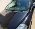Черный Ниссан Тиида, объемом двигателя 1.6 л и пробегом 228 тыс. км за 5000 $, фото 1 на Automoto.ua