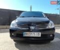 Черный Ниссан Тиида, объемом двигателя 1.6 л и пробегом 142 тыс. км за 5000 $, фото 1 на Automoto.ua