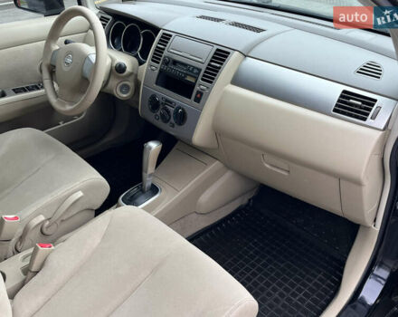 Черный Ниссан Тиида, объемом двигателя 1.6 л и пробегом 172 тыс. км за 6900 $, фото 34 на Automoto.ua