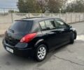 Черный Ниссан Тиида, объемом двигателя 1.8 л и пробегом 226 тыс. км за 4200 $, фото 2 на Automoto.ua