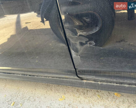 Черный Ниссан Тиида, объемом двигателя 1.6 л и пробегом 195 тыс. км за 5000 $, фото 11 на Automoto.ua