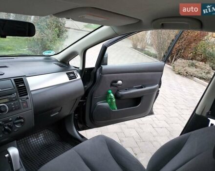 Черный Ниссан Тиида, объемом двигателя 1.6 л и пробегом 114 тыс. км за 6900 $, фото 5 на Automoto.ua