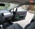 Черный Ниссан Тиида, объемом двигателя 1.6 л и пробегом 114 тыс. км за 6900 $, фото 5 на Automoto.ua