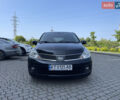 Черный Ниссан Тиида, объемом двигателя 1.8 л и пробегом 140 тыс. км за 5200 $, фото 1 на Automoto.ua