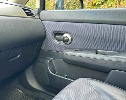 Черный Ниссан Тиида, объемом двигателя 1.6 л и пробегом 117 тыс. км за 7400 $, фото 12 на Automoto.ua