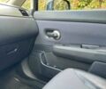 Черный Ниссан Тиида, объемом двигателя 1.6 л и пробегом 117 тыс. км за 7400 $, фото 12 на Automoto.ua