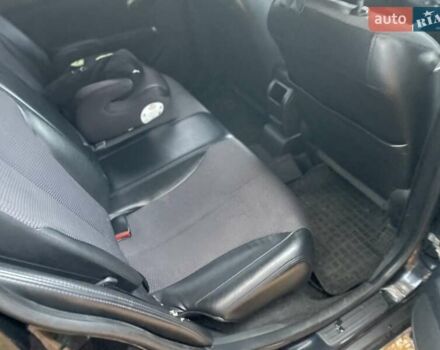 Черный Ниссан Тиида, объемом двигателя 1.6 л и пробегом 188 тыс. км за 6700 $, фото 11 на Automoto.ua