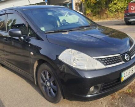 Черный Ниссан Тиида, объемом двигателя 1.6 л и пробегом 229 тыс. км за 5900 $, фото 2 на Automoto.ua