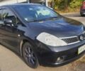 Черный Ниссан Тиида, объемом двигателя 1.6 л и пробегом 229 тыс. км за 5900 $, фото 2 на Automoto.ua