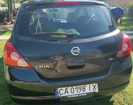 Черный Ниссан Тиида, объемом двигателя 1.6 л и пробегом 500 тыс. км за 4700 $, фото 2 на Automoto.ua