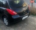 Черный Ниссан Тиида, объемом двигателя 1.6 л и пробегом 242 тыс. км за 5300 $, фото 1 на Automoto.ua