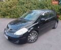 Черный Ниссан Тиида, объемом двигателя 1.6 л и пробегом 250 тыс. км за 5000 $, фото 1 на Automoto.ua