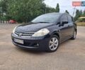 Черный Ниссан Тиида, объемом двигателя 1.6 л и пробегом 192 тыс. км за 6800 $, фото 3 на Automoto.ua