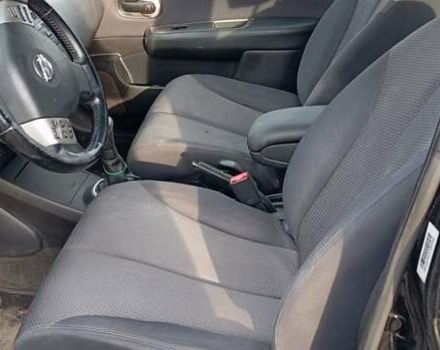 Черный Ниссан Тиида, объемом двигателя 1.6 л и пробегом 300 тыс. км за 4550 $, фото 2 на Automoto.ua