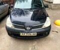 Черный Ниссан Тиида, объемом двигателя 1.6 л и пробегом 195 тыс. км за 6000 $, фото 1 на Automoto.ua
