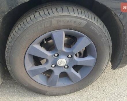 Черный Ниссан Тиида, объемом двигателя 1.6 л и пробегом 229 тыс. км за 5900 $, фото 9 на Automoto.ua