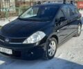 Черный Ниссан Тиида, объемом двигателя 1.6 л и пробегом 224 тыс. км за 5300 $, фото 1 на Automoto.ua