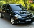 Черный Ниссан Тиида, объемом двигателя 1.6 л и пробегом 260 тыс. км за 4900 $, фото 1 на Automoto.ua