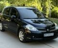 Черный Ниссан Тиида, объемом двигателя 1.6 л и пробегом 260 тыс. км за 5492 $, фото 1 на Automoto.ua