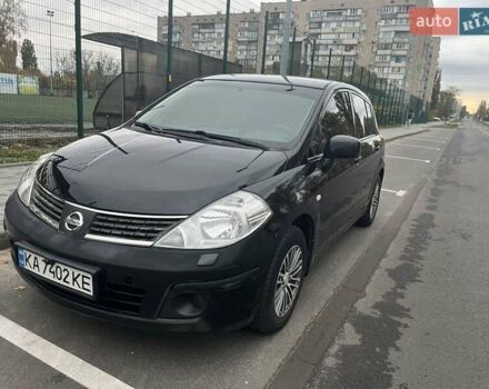 Черный Ниссан Тиида, объемом двигателя 1.6 л и пробегом 129 тыс. км за 5500 $, фото 2 на Automoto.ua