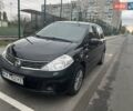 Черный Ниссан Тиида, объемом двигателя 1.6 л и пробегом 129 тыс. км за 5500 $, фото 2 на Automoto.ua