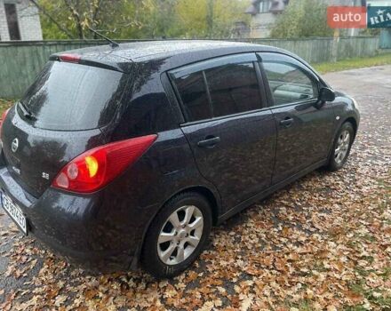 Черный Ниссан Тиида, объемом двигателя 1.6 л и пробегом 188 тыс. км за 6700 $, фото 2 на Automoto.ua