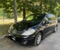 Чорний Ніссан Тііда, об'ємом двигуна 1.6 л та пробігом 111 тис. км за 6750 $, фото 1 на Automoto.ua