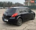 Черный Ниссан Тиида, объемом двигателя 1.6 л и пробегом 177 тыс. км за 6200 $, фото 4 на Automoto.ua
