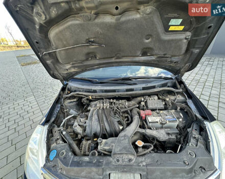 Черный Ниссан Тиида, объемом двигателя 1.6 л и пробегом 169 тыс. км за 6200 $, фото 18 на Automoto.ua