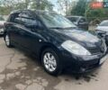 Черный Ниссан Тиида, объемом двигателя 1.6 л и пробегом 230 тыс. км за 5890 $, фото 1 на Automoto.ua
