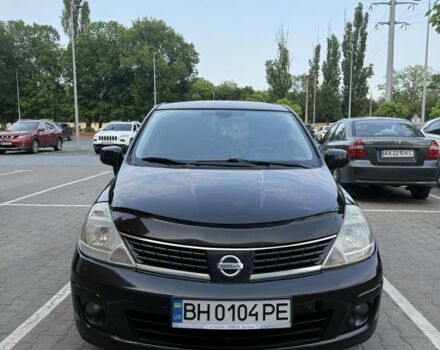 Черный Ниссан Тиида, объемом двигателя 1.6 л и пробегом 228 тыс. км за 5900 $, фото 1 на Automoto.ua