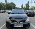 Черный Ниссан Тиида, объемом двигателя 1.6 л и пробегом 228 тыс. км за 5900 $, фото 1 на Automoto.ua