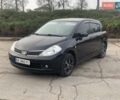 Черный Ниссан Тиида, объемом двигателя 1.6 л и пробегом 177 тыс. км за 6200 $, фото 1 на Automoto.ua