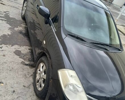 Черный Ниссан Тиида, объемом двигателя 1.6 л и пробегом 220 тыс. км за 5498 $, фото 2 на Automoto.ua