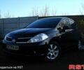 Черный Ниссан Тиида, объемом двигателя 1.6 л и пробегом 195 тыс. км за 6400 $, фото 1 на Automoto.ua