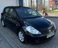 Черный Ниссан Тиида, объемом двигателя 1.6 л и пробегом 220 тыс. км за 5950 $, фото 1 на Automoto.ua