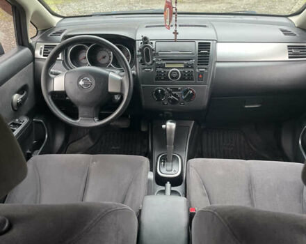 Черный Ниссан Тиида, объемом двигателя 1.6 л и пробегом 138 тыс. км за 6400 $, фото 18 на Automoto.ua