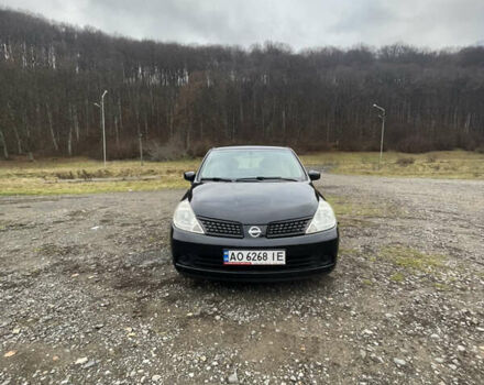 Черный Ниссан Тиида, объемом двигателя 1.6 л и пробегом 138 тыс. км за 6400 $, фото 4 на Automoto.ua