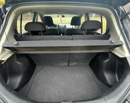 Черный Ниссан Тиида, объемом двигателя 1.6 л и пробегом 138 тыс. км за 6400 $, фото 26 на Automoto.ua